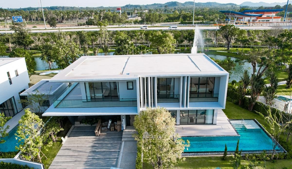 Glory Village — villa exterior by the lake