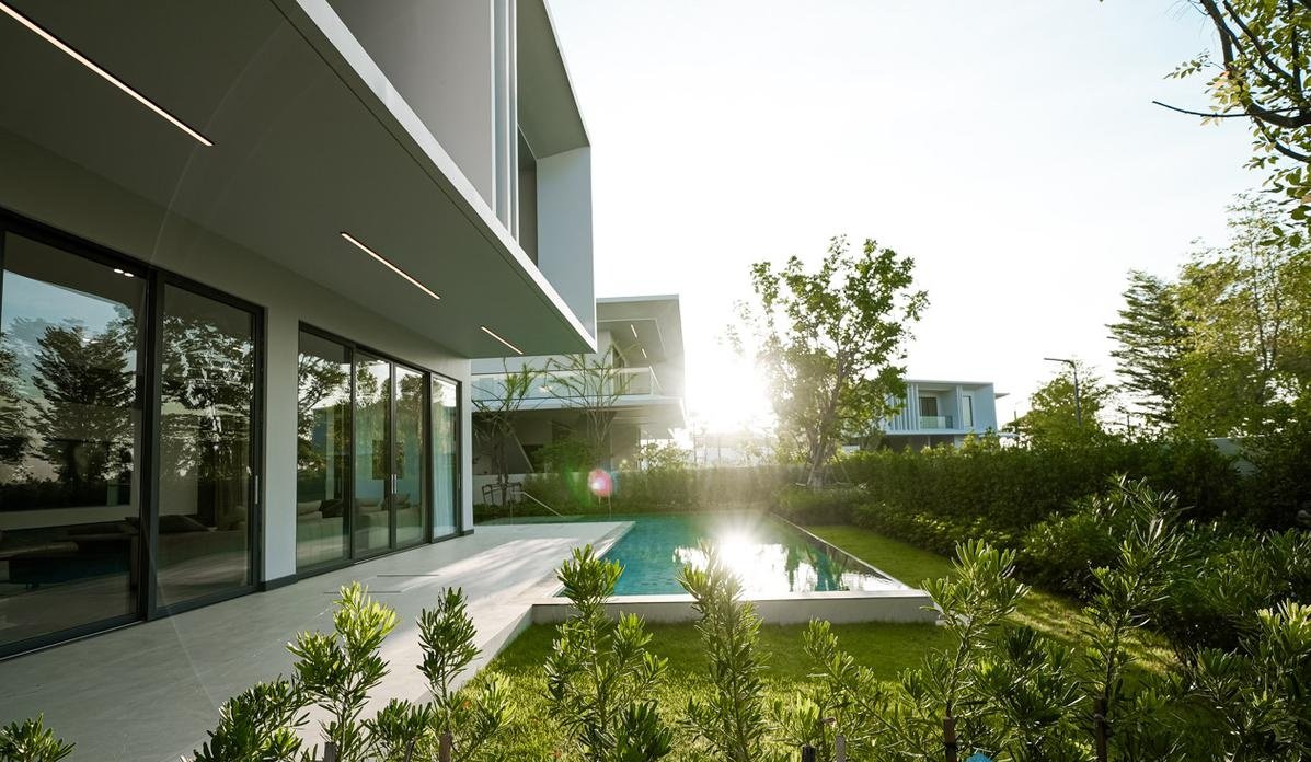 Glory Village — poolside terrace at sunset